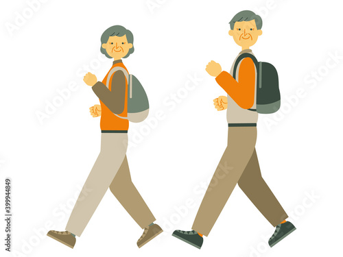 リュックを背負って歩く夫婦