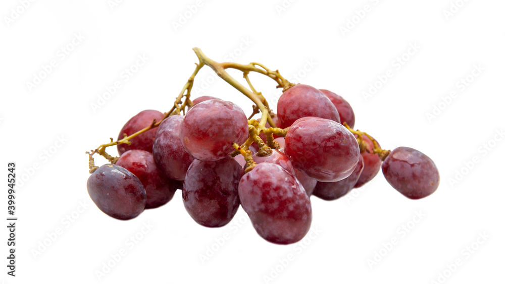 Obraz premium Close up a bunch of fresh red grapes on isolated white background.