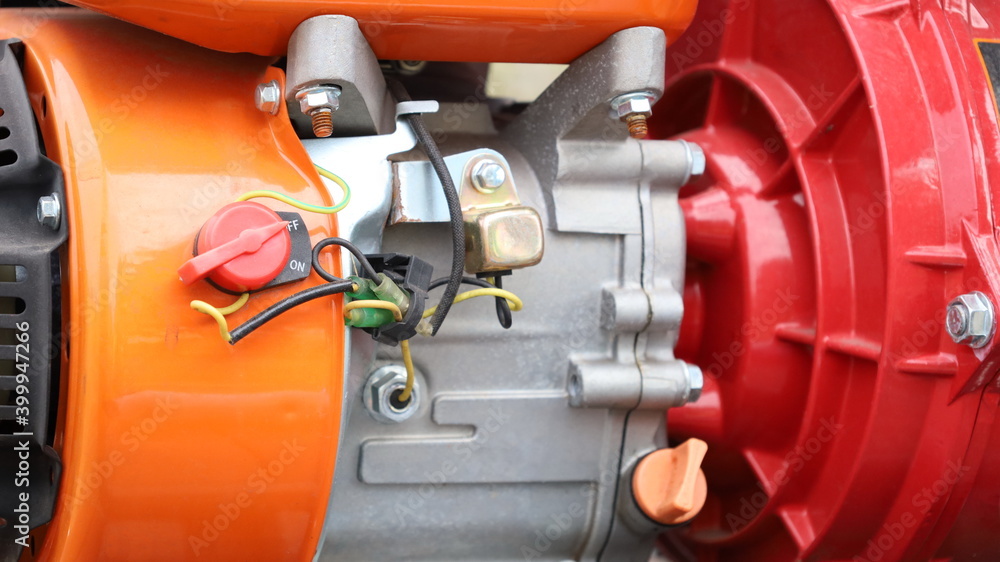 Engine on-off switch. Electric circuit control switch on a small pump with copy space. Choose content and focus