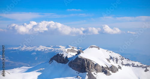  Swiss Alps mountain with  cloudy and blue sky background photo