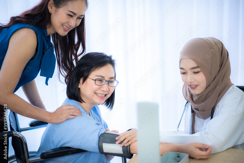 senior woman patient and young woman doctor, friendly doctor encouragement, empathy and support following a medical examination. Trust and medical ethics concept senior woman patient and young woman doctor, friendly doctor encouragement, empathy and support following a medical examination. Trust and medical ethics concept