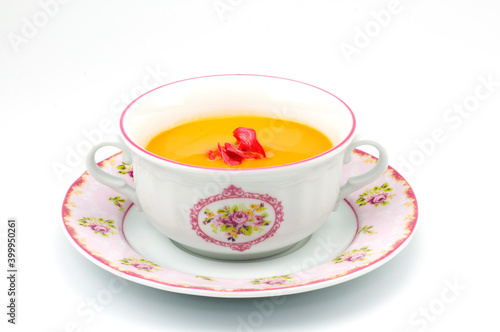 Delicious vegetable soup in bowl on white background