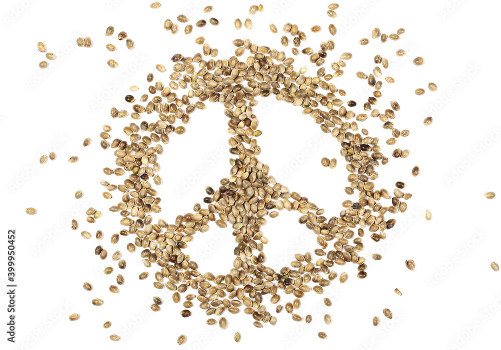 Hemp seed hippie peace sign, symbol isolated on white background, top view Hemp seed hippie peace sign, symbol isolated on white background, top view
