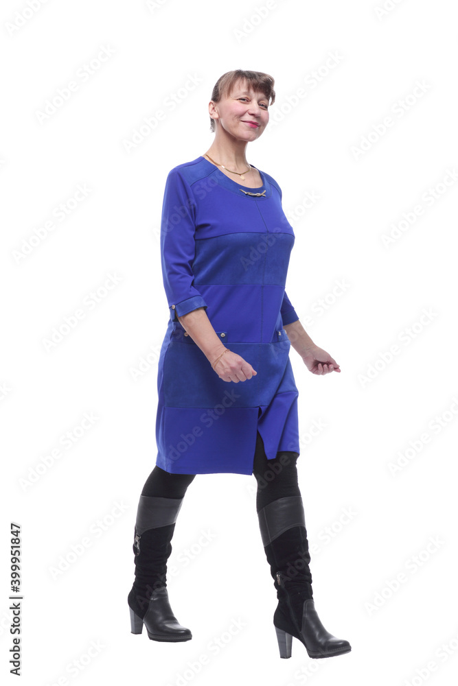 Fototapeta premium Woman walking towards the camera and smiling