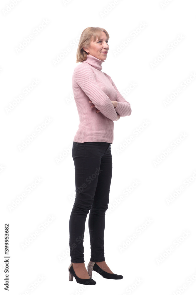 Full length, side view of a confident business woman standing with folded hands Full length, side view of a confident business woman standing with folded hands