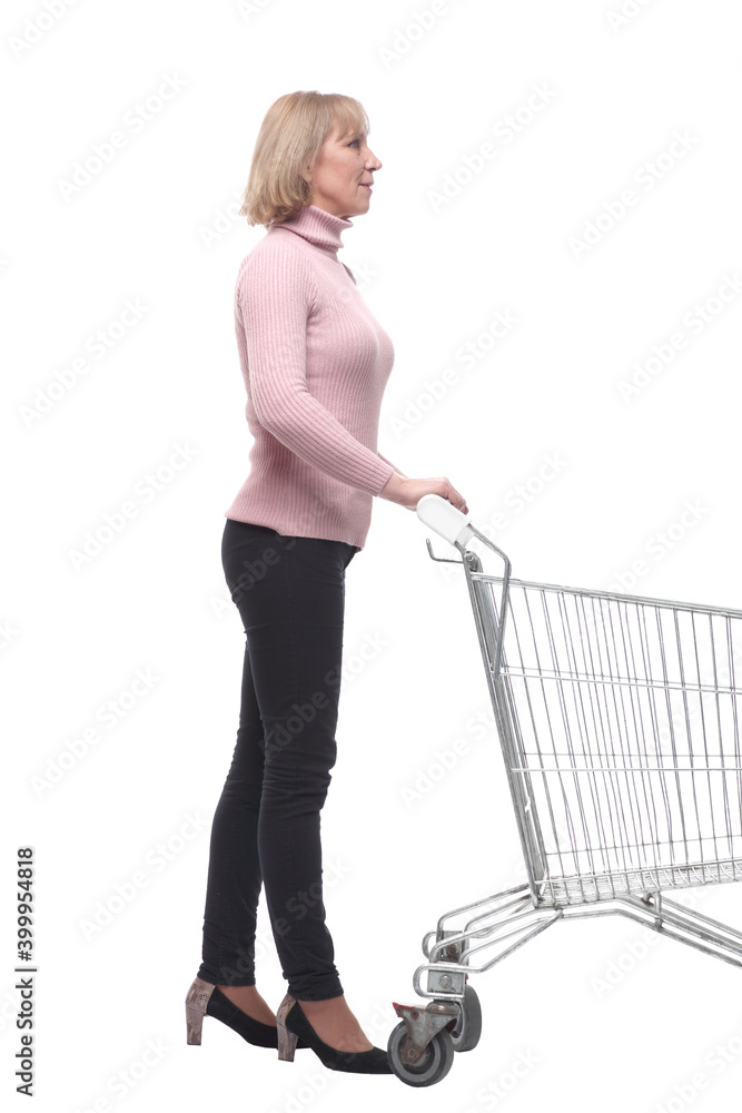 Full length portrait of a woman pushing a shopping trolley Full length portrait of a woman pushing a shopping trolley