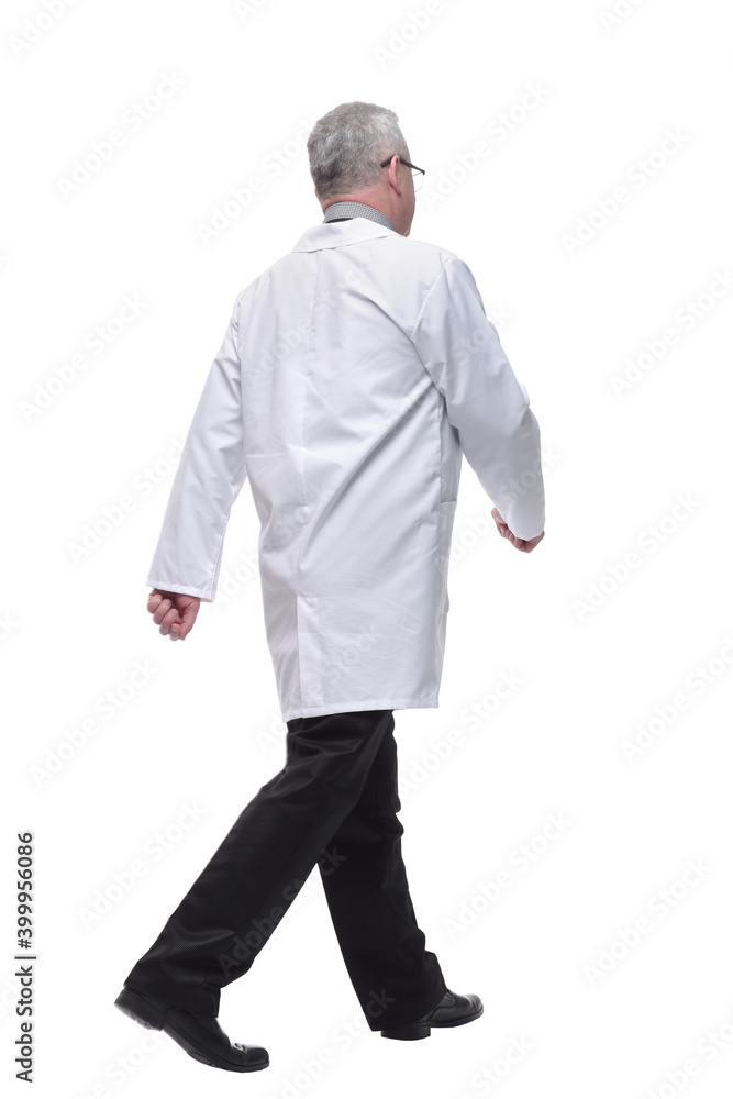 Back view walking doctor in a robe hurrying to help the patient Back view walking doctor in a robe hurrying to help the patient