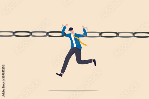 Business risk, vulnerability, danger and weakness or conflict causing failure in business and investment concept, tried fatigue businessman trying to hold broken chain together with his low energy.