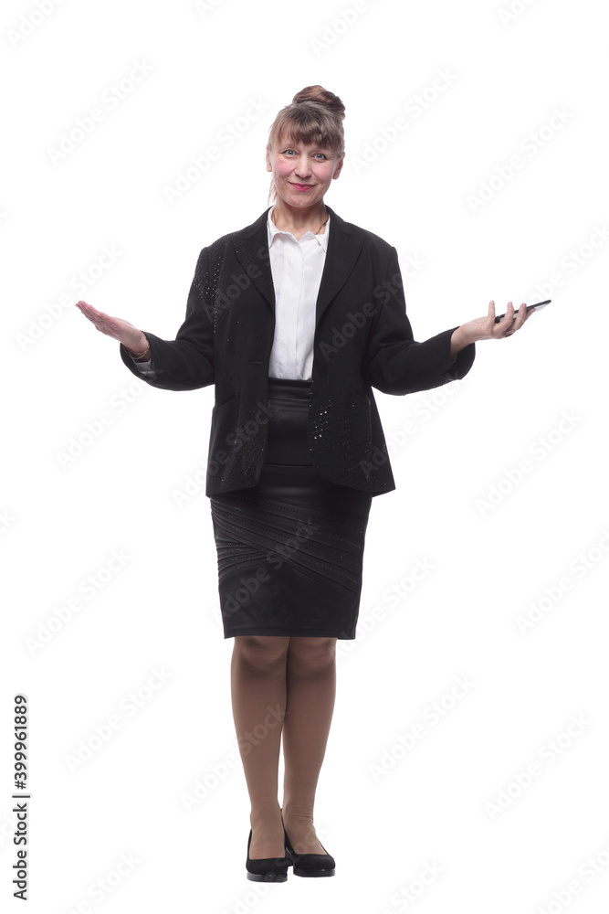 Full-length portrait of smiley businesswoman in formal wear looking at smartphone Full-length portrait of smiley businesswoman in formal wear looking at smartphone