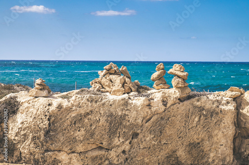 Rocky coast of Paphos, Cyprus. Tombs of the Kings tourist attraction. 