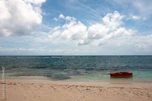 a red boat on the sea