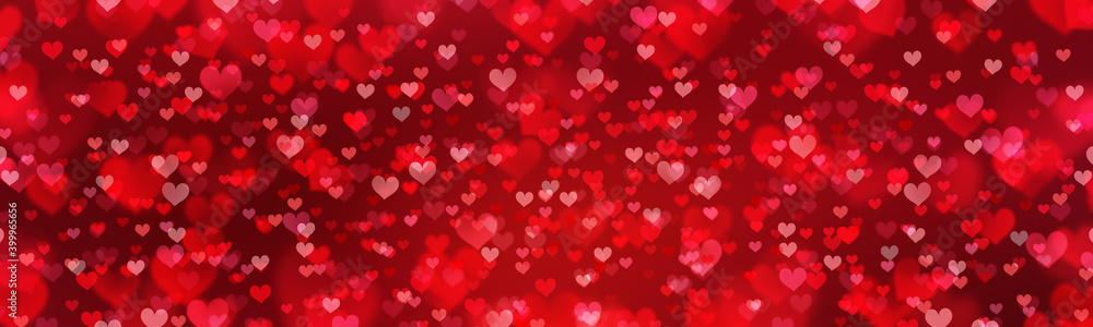 Valentine's Day red abstract background with  glittering hearts.
