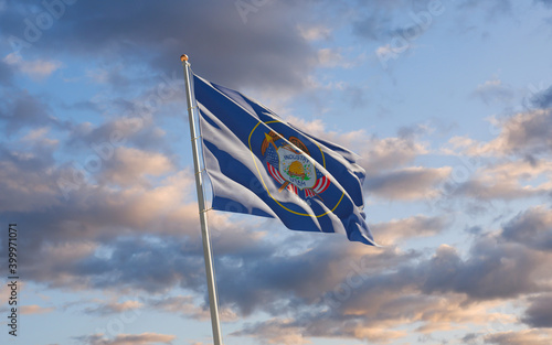 Utah US State Flag at sky background.