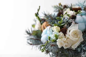 Beautiful wedding winter bouquet on light background, closeup