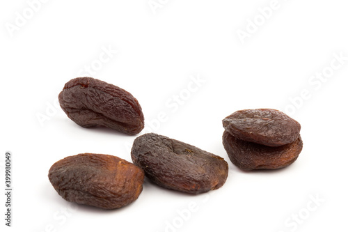 Naturally dried apricots isolated on white background.