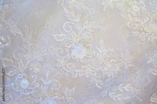 Lace and embroidery with beads on fabric