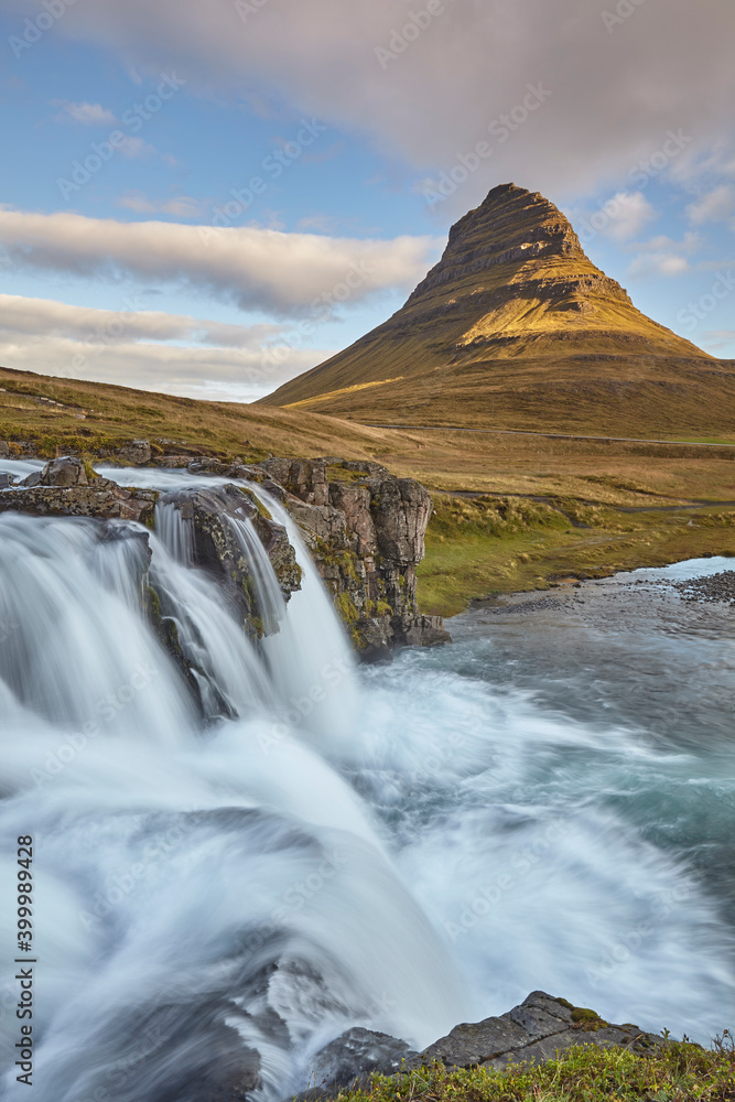 One of Iceland's iconic landscapes, Mount Kirkjufell and Kirkjufellsfoss Falls, near Grundarfjordur, Snaefellsnes peninsula, Iceland One of Iceland's iconic landscapes, Mount Kirkjufell and Kirkjufellsfoss Falls, near Grundarfjordur, Snaefellsnes peninsula, Iceland