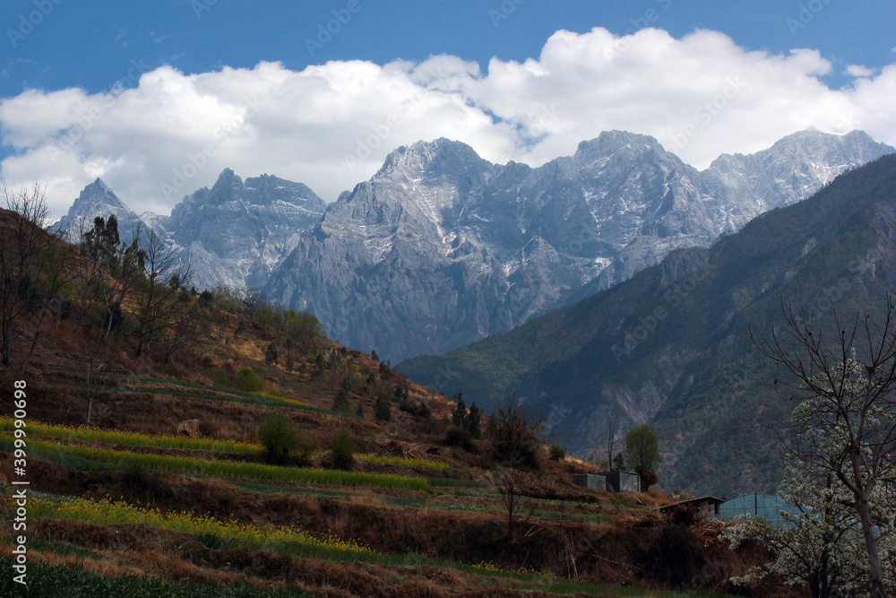 Jade Dragon Snow Mountain, or Yulong Xueshan, and one of the deepest ravines of the world, Tiger Leaping Gorge in Yunnan, Southern China