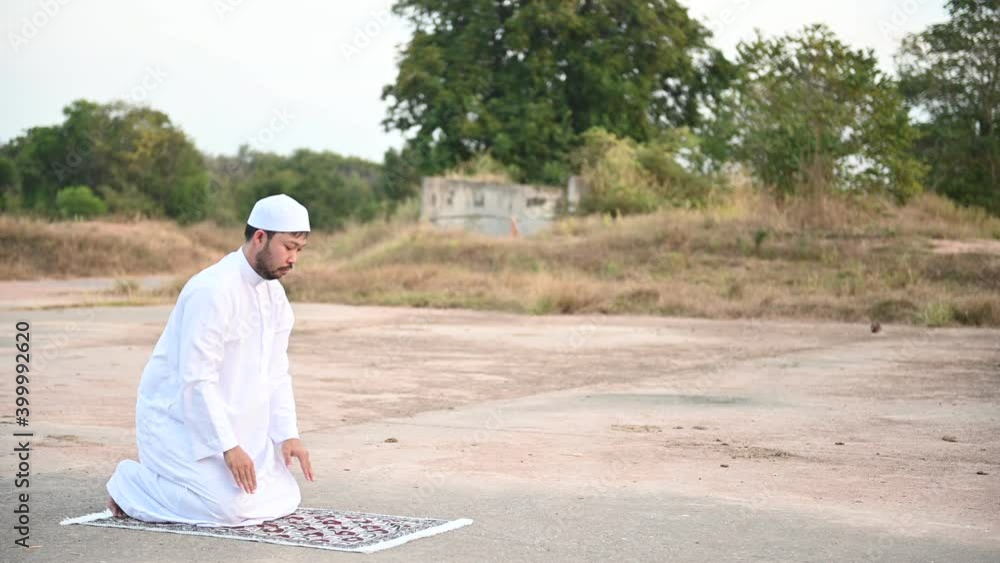 Asian islam man prayer,Young Muslim praying,Ramadan festival concept Asian islam man prayer,Young Muslim praying,Ramadan festival concept
