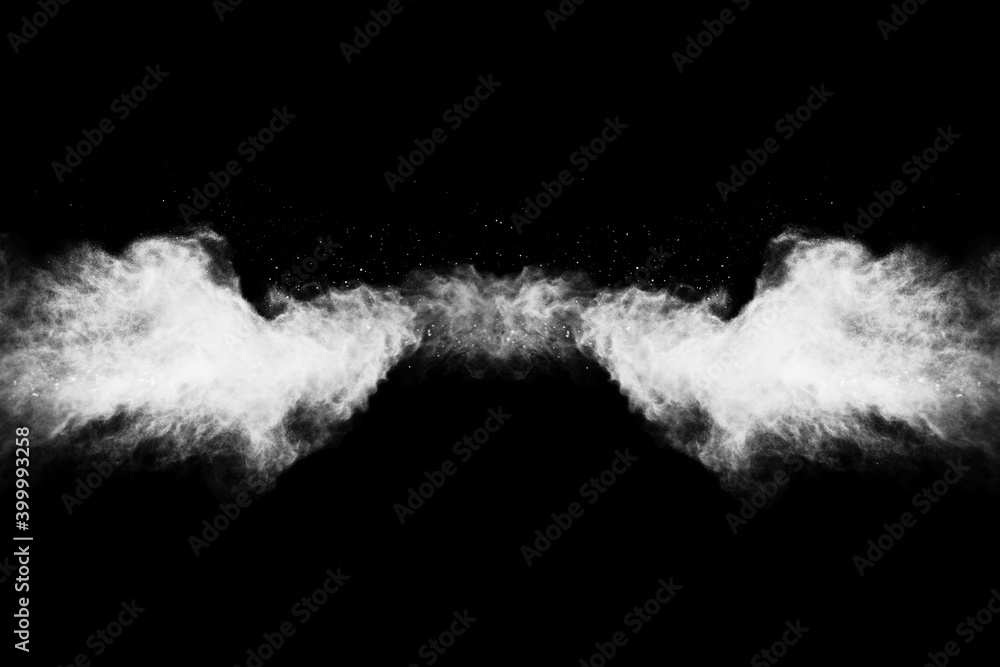 White powder explosion on black background. Colored cloud. Colorful dust explode. Paint Holi. White powder explosion on black background. Colored cloud. Colorful dust explode. Paint Holi.