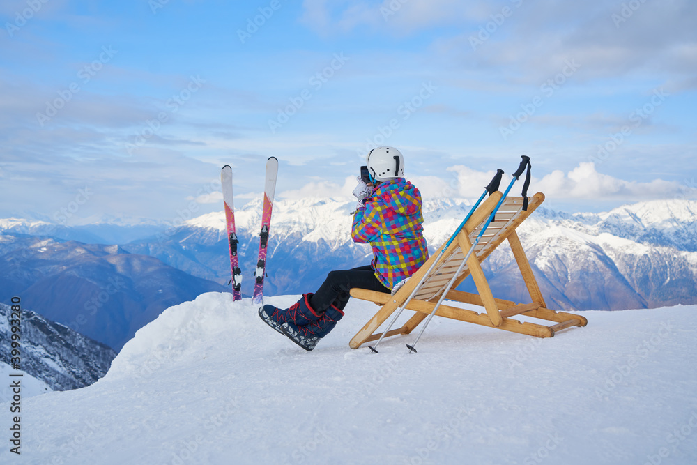 Girl Makes A Selfie In Ski Clothing On Snow Mountain. Stock Photo