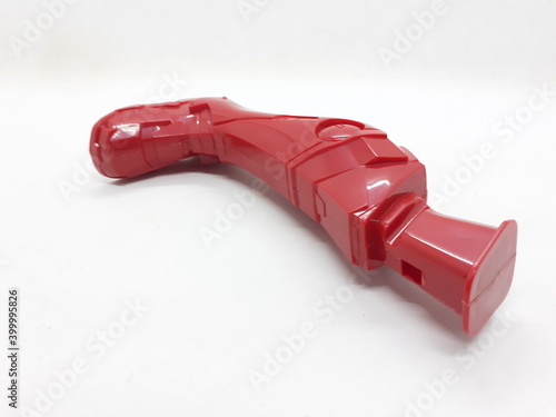 Red Painted Robotic Cyborg Plastic Leg and Foot Part in White Isolated Background