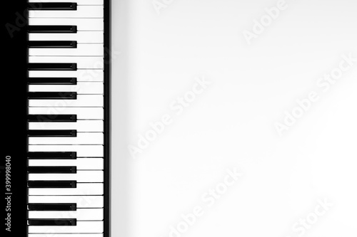 Top view to piano on white background. Music learning concept. Top view