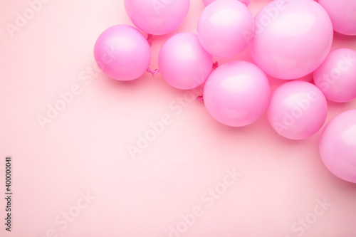 Pink balloons on pastel pink background. Birthday, holiday concept. © Mouse family