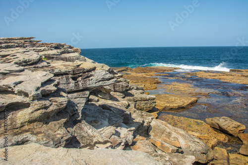 Dramatic rocky coastline of the Shark Point on the Coogee - Bondi Coastal Walk near Sydney, New South Wales, Australia