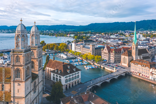 Beautiful autumn aerial cityscape of Zurich, Switzerland. Architectural landmarks of the city: Munsterbrucke, Grossmunster and Fraumunster Cathedral