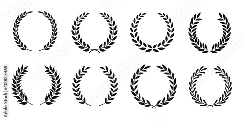 Set of black and white silhouette of circular laurel wreaths depicting award, achievement, heraldry, nobility. Vector illustration eps 10