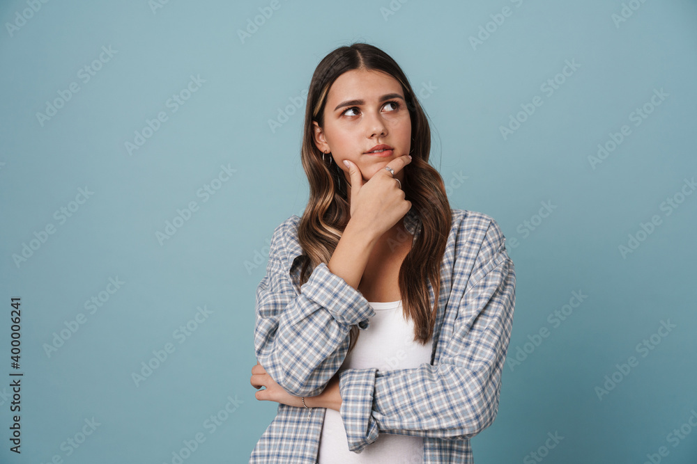 Serious beautiful nice girl thinking and looking aside Serious beautiful nice girl thinking and looking aside