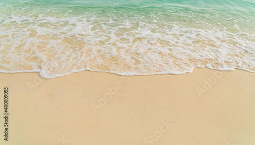waves on the sand beach overhead 