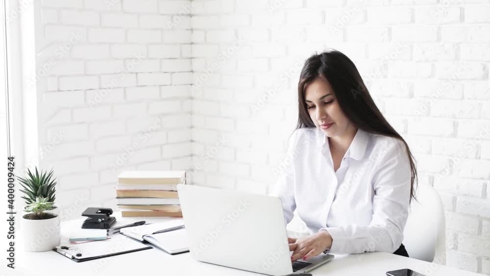 Distance learning. E-learning. Woman chatting online using tablet Distance learning. E-learning. Woman chatting online using tablet