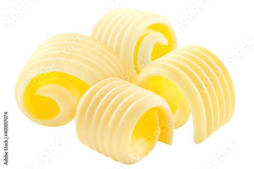 Butter curls rolled up, a group of four,  isolated
