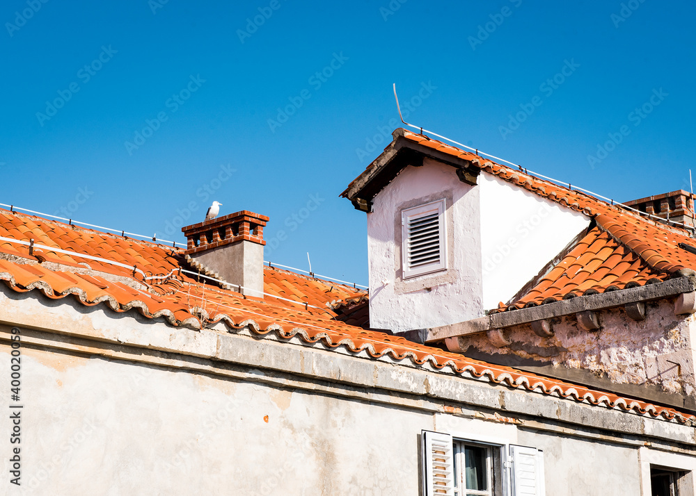 The red tiled roof with window in Dubrovnik, Croatia