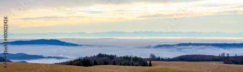 landscape with a sea of fog in the valley seen from the mountain