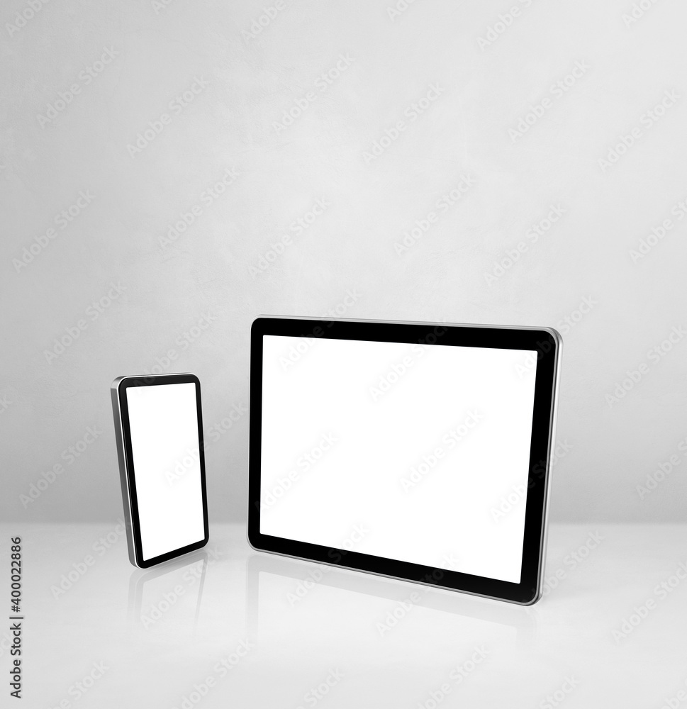 Mobile phone and digital tablet pc on white concrete office desk Mobile phone and digital tablet pc on white concrete office desk