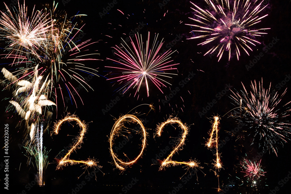 2021 new year written with fireworks as a background 2021 new year written with fireworks as a background