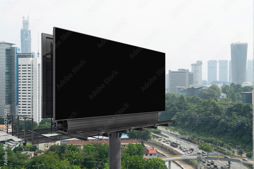 Blank black road billboard with Kuala Lumpur cityscape background at day time. Street advertising poster, mock up, 3D rendering. Side view. The concept of marketing communication. Blank black road billboard with Kuala Lumpur cityscape background at day time. Street advertising poster, mock up, 3D rendering. Side view. The concept of marketing communication.