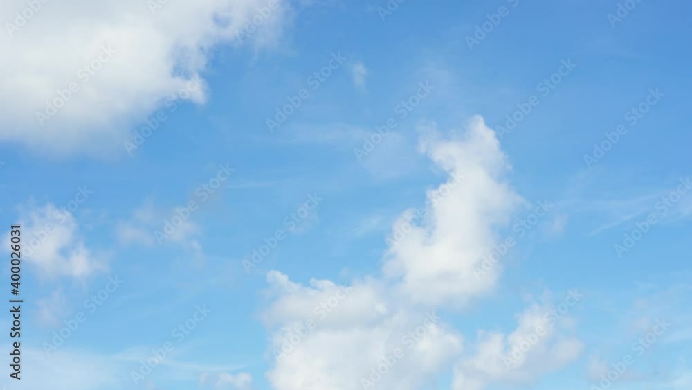 Time Lapse dark clouds cover the beautiful azure sky on a sunny day. Time Lapse dark clouds cover the beautiful azure sky on a sunny day.