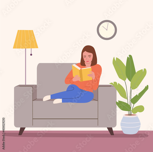 Young woman is relaxing on comfortable chair and reading book. Vector flat illustration