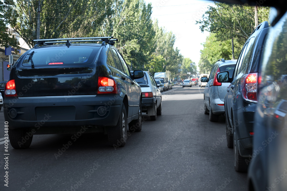 Cars in traffic jam on city street