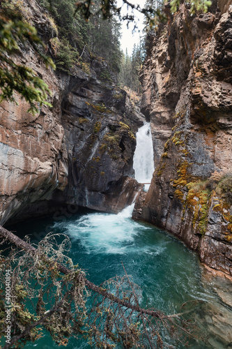 Lower falls flowing in Johnston Canyon at Banff national park