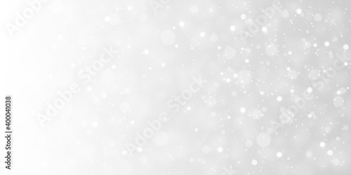 abstract christmas background with snow and bokeh white background © arwiyada