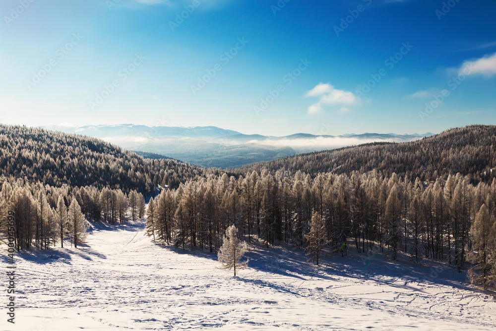 The Altai mountains on a sunny frosty winter day. Altai Republic, Western Siberia, Russia