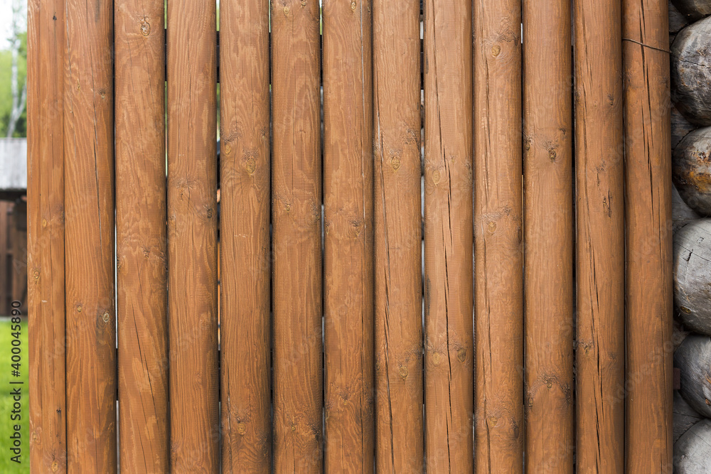 smooth background of many light brown round wooden boards. wood texture smooth background of many light brown round wooden boards. wood texture