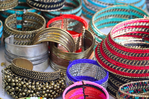 Colorful Designer Handcrafted Bangles Or Bracelets Asian Indian Choodiyan Chudiyan Ornaments Made Of Beads And Metals photo