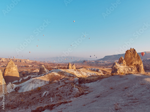 Hot air balloon in Cappadocia on the sunrise.