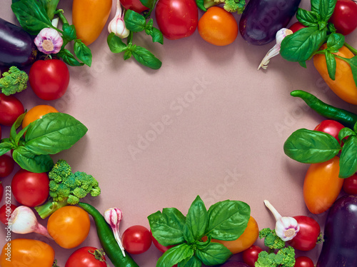 Frame of various  vegetables on background, top view. Frame of organic food with space for text. © Kulbabka